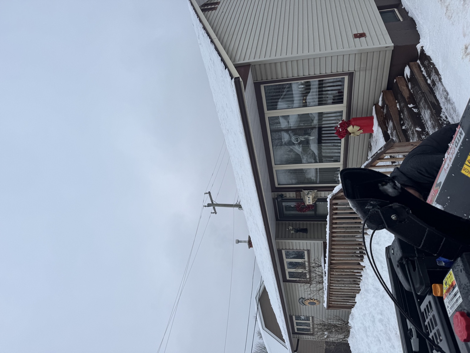 A bungalow with its roof fully cleared of snow after a Roofline visit